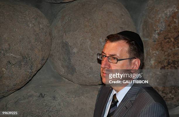 Belgian Foreign Minister Steven Vanackere wears a kippa, the traditional Jewish skullcap, during a visit to the Yad Vashem Holocaust memorial in...