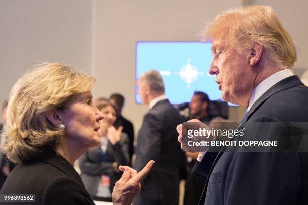 Ambassador to NATO Kay Bailey Hutchison speaks with US President Donald Trump ahead of a working dinner at The Parc du Cinquantenaire - Jubelpark...