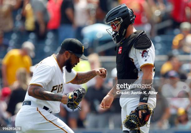 Felipe Vazquez of the Pittsburgh Pirates reacts with Francisco Cervelli of the Pittsburgh Pirates after defeating the \n 2-0 at PNC Park on July 11,...