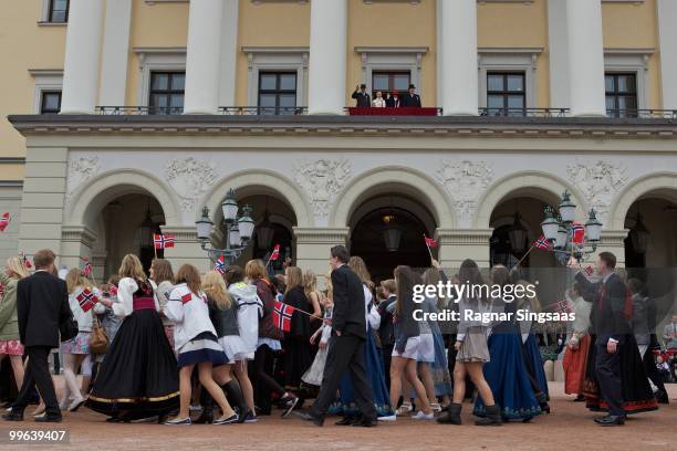 Members of the Norwegian Royal family watch the Children's Parade on Norway's National day on May 17, 2010 in Oslo, Norway.