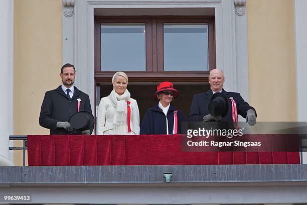 Crown Prince Haakon of Norway, Crown Princess Mette-Marit of Norway, Queen Sonja of Norway and King Harald V of Norway attend The Children's Parade...