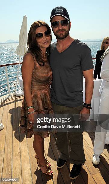 Gerard Butler and Ella Krasner attend the Amend Charity Luncheon at the Hotel du Cap as part of the 63rd Cannes Film Festival on May 17, 2010 in...