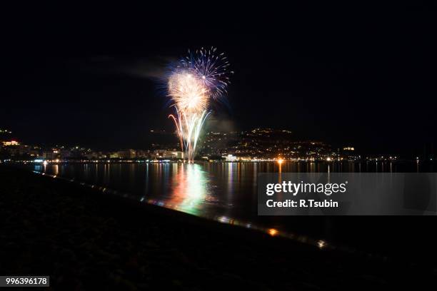 the night of san juan with fireworks in spain - bonfires in the night of san juan stock pictures, royalty-free photos & images