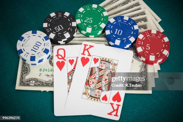 cards king and queen combination in black jack in hand - baltic ace stock pictures, royalty-free photos & images