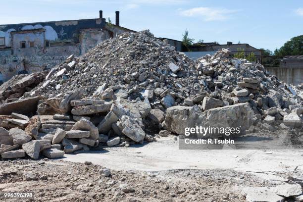 concrete rubble debris on construction site - detriti foto e immagini stock