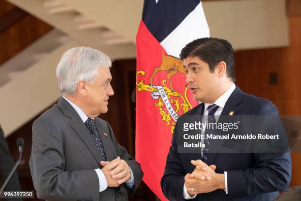 President of Costa Rica Carlos Alvarado and President of Chile Sebastian Pinera talk prior a press conference as part of an Official Visit to Costa...