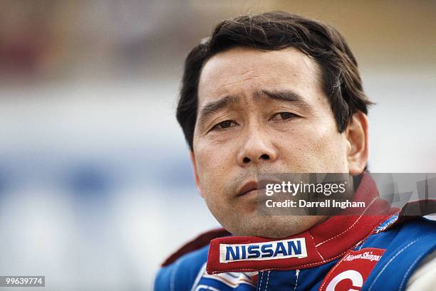 Masahiro Hasemi driver of the Nissan Motorsports International Nissan R90CP during the FIA World Sportscar Championship 24 Hours of Le Mans race on...