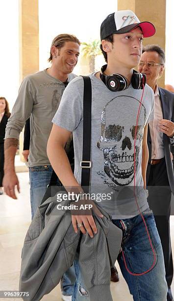 Players of the German national football team midfielder Mesut Oezil and goalkeeper Tim Wiese arrive on May 17, 2010 in Sciacca, Sicily, for a...