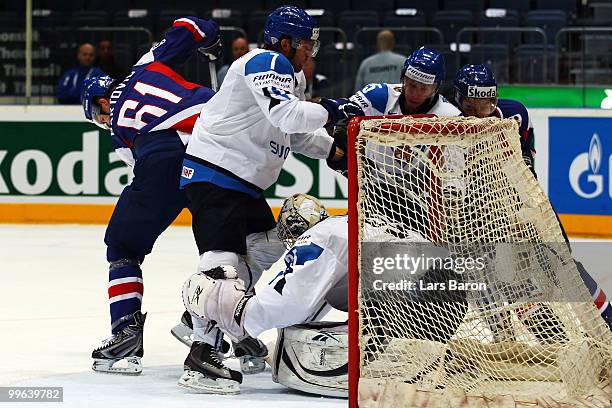 Goalie Pekka Rinne of Finland saves a shoot of Milan Bartovic of Slovakia during the IIHF World Championship qualification round match between...