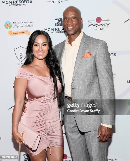 Cece Gutierrez and former NBA player and coach Byron Scott attend the 5th Anniversary gala for the Coach Woodson Invitational presented by MGM...