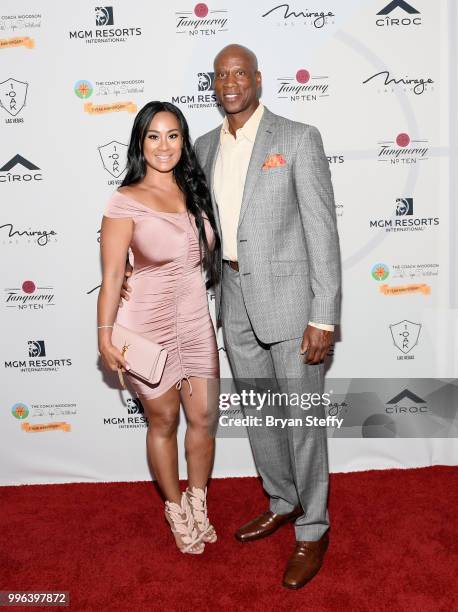 Cece Gutierrez and former NBA player and coach Byron Scott attend the 5th Anniversary gala for the Coach Woodson Invitational presented by MGM...