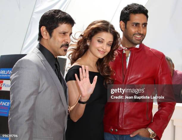 Chiyaan' Vikram, Abhishek Bachchan and Aishwarya Rai Bachchan attend the 'Raavan' Photocall at the Salon Diane at The Majestic during the 63rd Annual...