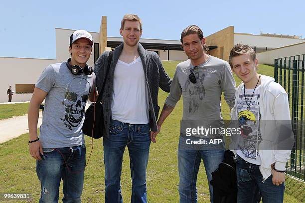 Players of the German national football team midfielder Mesut Oezil, defender Per Mertesacker, goalkeeper Tim Wiese and midfielder Marko Marin, all...