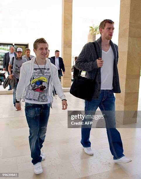 Players of the German national football team midfielder Marko Marin and defender Per Mertesacker arrive on May 17, 2010 in Sciacca, Sicily, for a...