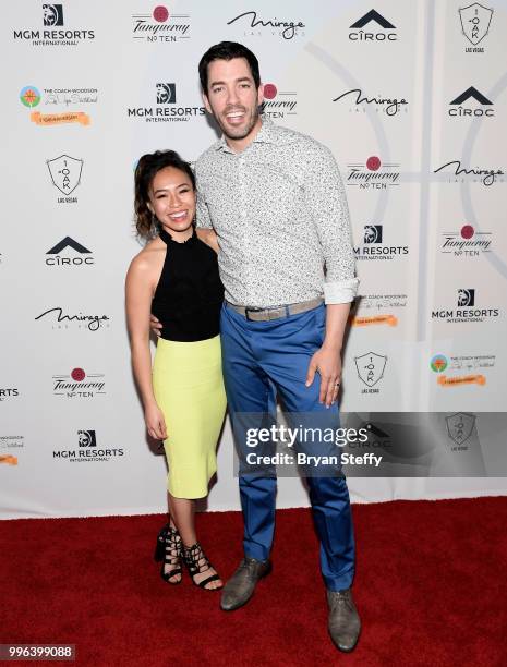 Television personalities Linda Pham and Drew Scott attend the 5th Anniversary gala for the Coach Woodson Invitational presented by MGM Resorts...