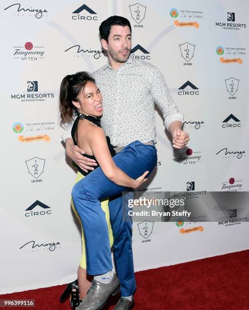 Television personalities Linda Pham and Drew Scott attend the 5th Anniversary gala for the Coach Woodson Invitational presented by MGM Resorts...