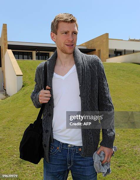 Per Mertesacker, defender of the German national football team, poses as he arrives on May 17, 2010 in Sciacca, Sicily, for a training camp. The...