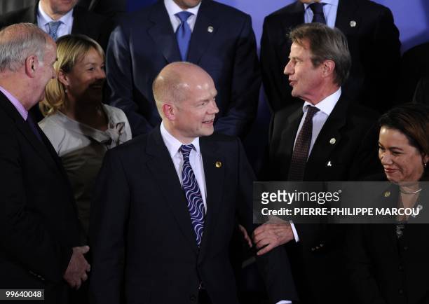 British Foreign Minister William Hague , French Foreign Affairs Minister Bernard Kouchner and other ministers gather for the group picture during the...