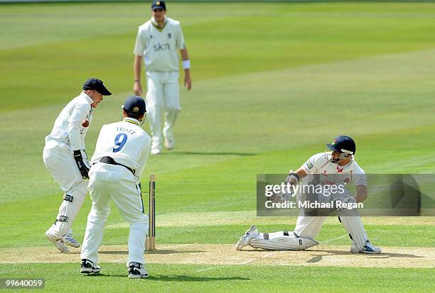 Ashwell Prince of Lancashire is bowled by Imran Tahir of Warwickshire as Jonathan Trott and Timothy Ambrose watch on during the LV County...