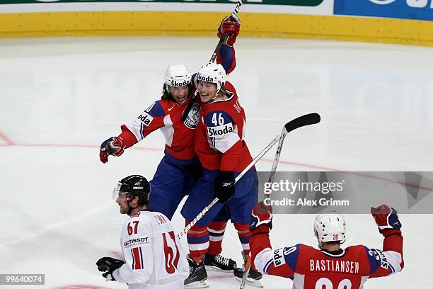 Lars Erik Spets of Norway celebrates his team's second goal with team mates Mathis Olimb and Anders Bastiansen as Romano Lemm of Switzerland reacts...