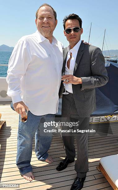 Producer Harvey Weinstein and Marc Anthony drinking a Grey Goose cocktail at the Business of Film lunch on "Odessa" boat on May 17, 2010 in Cannes,...