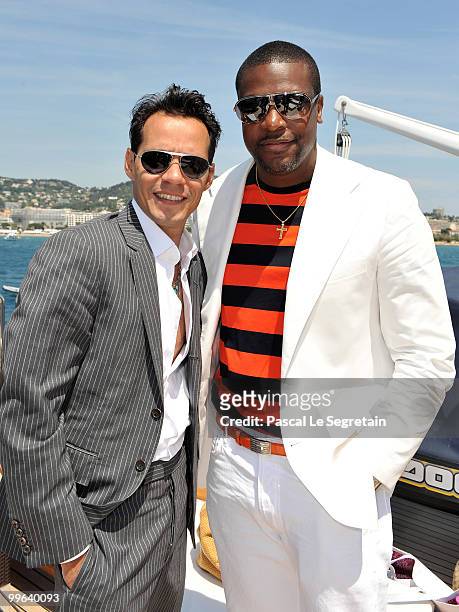 Marc Anthony and Chris Tucker attend a Business of Film Lunch With Grey Goose Vodka on "Odessa" boat on May 17, 2010 in Cannes, France.