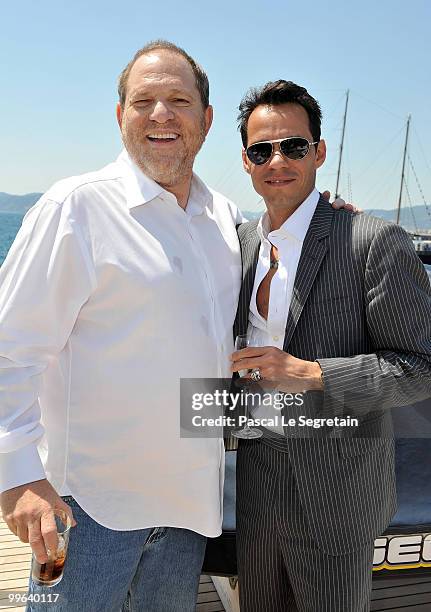 Producer Harvey Weinstein and Marc Anthony drinking a Grey Goose cocktail at the Business of Film lunch on "Odessa" boat on May 17, 2010 in Cannes,...