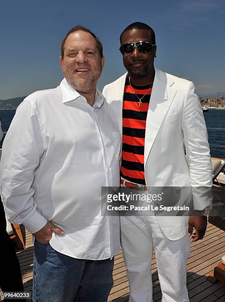 Producer Harvey Weinstein and Chris Tucker attend a Business of Film Lunch With Grey Goose Vodka on "Odessa" boat on May 17, 2010 in Cannes, France.
