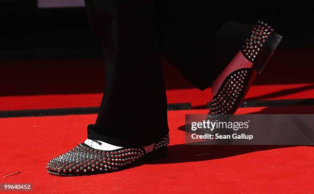 Close up of shoes worn by a model designed by Christian Louboutin at 'Le Carrosse Noir And The Loubi's Angels' presented by Christian Louboutin at...