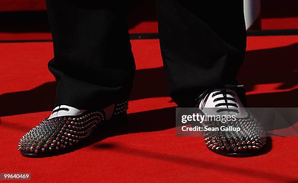 Close up of shoes worn by a model designed by Christian Louboutin at 'Le Carrosse Noir And The Loubi's Angels' presented by Christian Louboutin at...