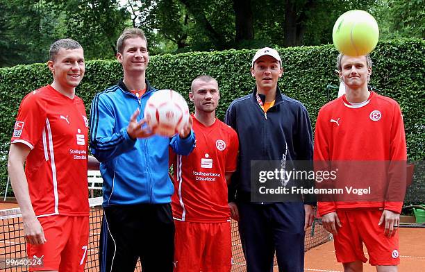 Oliver Fink, Florian Mayer, Marco Christ, Andreas Beck and Claus Costa play football tennis during the second day of the ARAG World Team Cup at the...