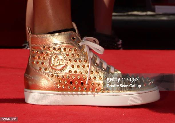 Close up of shoes worn by a model designed by Christian Louboutin at 'Le Carrosse Noir And The Loubi's Angels' presented by Christian Louboutin at...