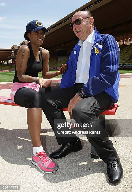 Suzanne 'Africa' Engo prepares to run under the supervision of her coach Elio Locatelli, IAAF Director, at the Stade Louis II on May 17, 2010 in...