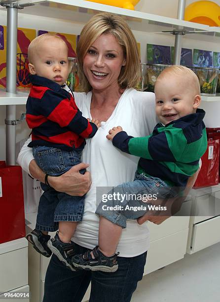 Actress Julie Bowen and her twins John and Gus attend their birthday event presented by The Coop and Baby2Baby held at The COOP on May 7, 2010 in...