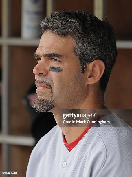 Mike Lowell of the Boston Red Sox looks on from the dugout against the Detroit Tigers during the game at Comerica Park on May 16, 2010 in Detroit,...