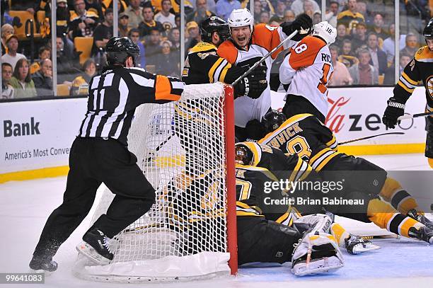 Arron Asham of the Boston Bruins celebrates a goal against the Philadelphia Flyers in Game Seven of the Eastern Conference Semifinals during the 2010...