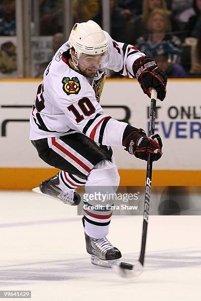 Patrick Sharp of the Chicago Blackhawks moves the puck while taking on the San Jose Sharks in Game One of the Western Conference Finals during the...
