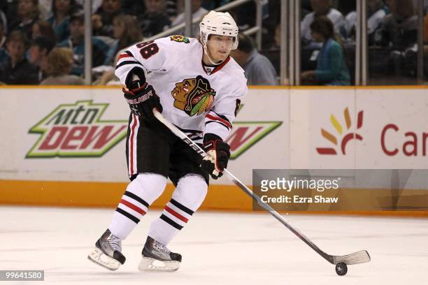 Patrick Kane of the Chicago Blackhawks moves the puck while taking on the San Jose Sharks in Game One of the Western Conference Finals during the...
