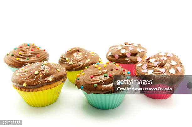 fancy cupcakes - cupcake holder stock pictures, royalty-free photos & images