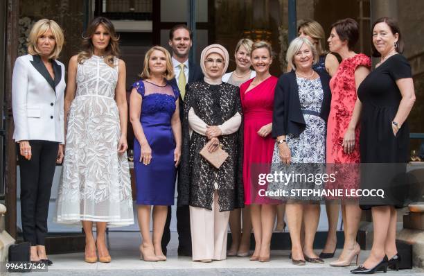 French First lady Brigitte Macron, US First Lady Melania Trump, Malgorzata Tusk, Husband of Luxembourg's pime minister Gauthier Destenay, First Lady...