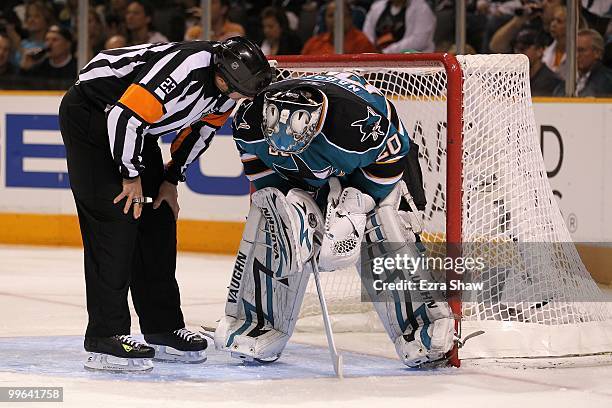 Goaltender Evgeni Nabokovof the San Jose Sharks talks to a referee while taking on the Chicago Blackhawks in Game One of the Western Conference...