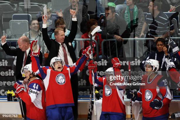 Head coach Roy Johansen and players of Norway celebrate after winning the IIHF World Championship group F qualification round match between Norway...