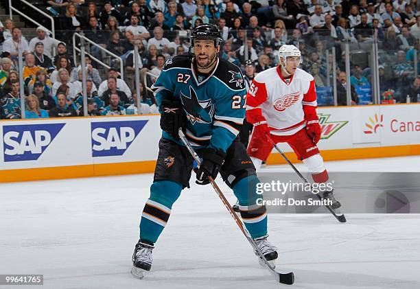 Valtteri Filppula of the Detroit Red Wings watches Manny Malhotra of the San Jose Sharks in Game Five of the Western Conference Semifinals during the...