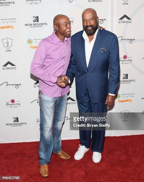 Sports broadcaster and former NBA player Greg Anthony and former NBA player and coach Mike Woodson attend the 5th Anniversary gala for the Coach...