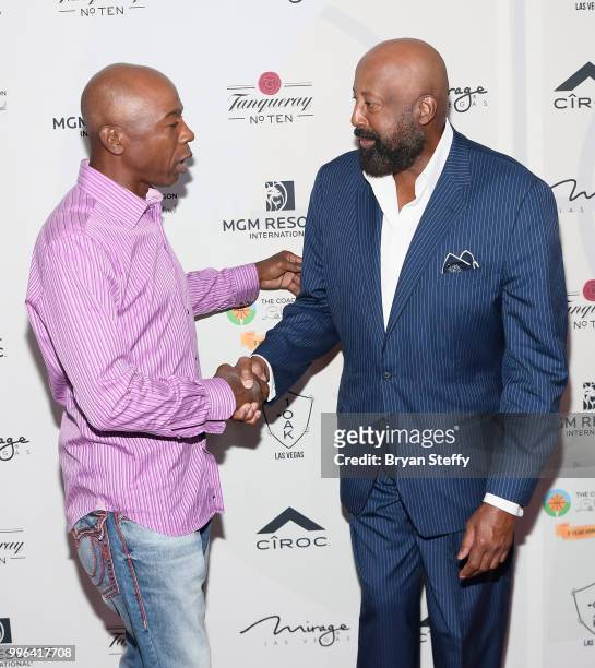 Sports broadcaster and former NBA player Greg Anthony and former NBA player and coach Mike Woodson attend the 5th Anniversary gala for the Coach...