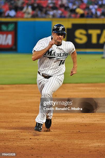 Gaby Sanchez of the Florida Marlins runs to third base during a MLB game against the New York Mets in Sun Life Stadium on May 13, 2010 in Miami,...