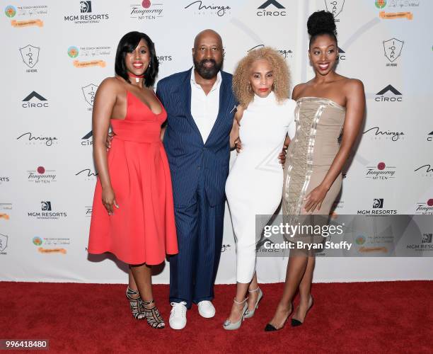 Alexis Woodson, former NBA player and coach Mike Woodson, Terri Woodson and Mariah Woodson attend the 5th Anniversary gala for the Coach Woodson...