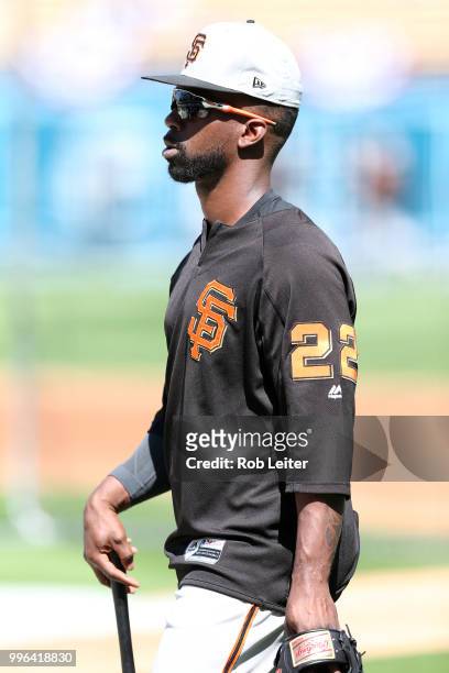 Andrew McCutchen of the San Francisco Giants looks on before the game against the Los Angeles Dodgers at Dodger Stadium on Thursday, March 29, 2018...