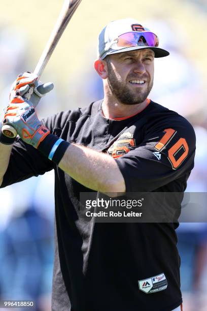 Evan Longoria of the San Francisco Giants looks on before the game against the Los Angeles Dodgers at Dodger Stadium on Thursday, March 29, 2018 in...