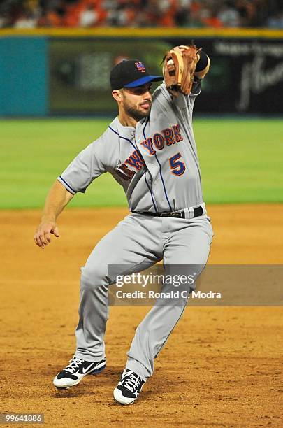 David Wright of the New York Mets fields a ball during a MLB game against the Florida Marlins in Sun Life Stadium on May 14, 2010 in Miami, Florida.